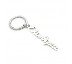 Handmade sterling silver name plate on a keychain